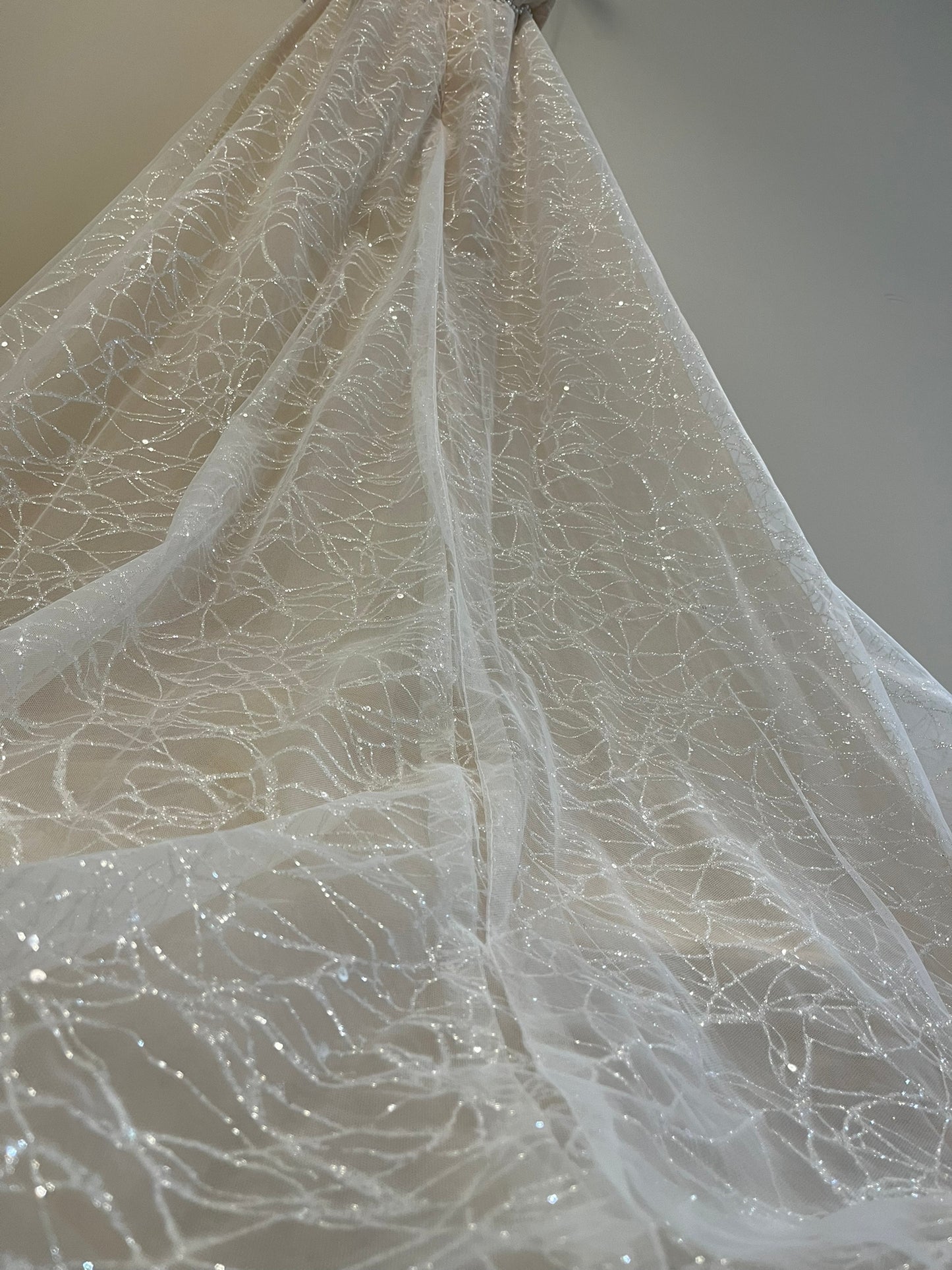 glitter train on Lucinda 3012: Shimmering Off-the-Shoulder A-line Tulle Wedding Dress